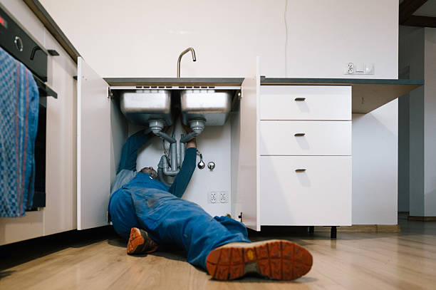 Professional Drain Cleaning technician working in Junction, IL